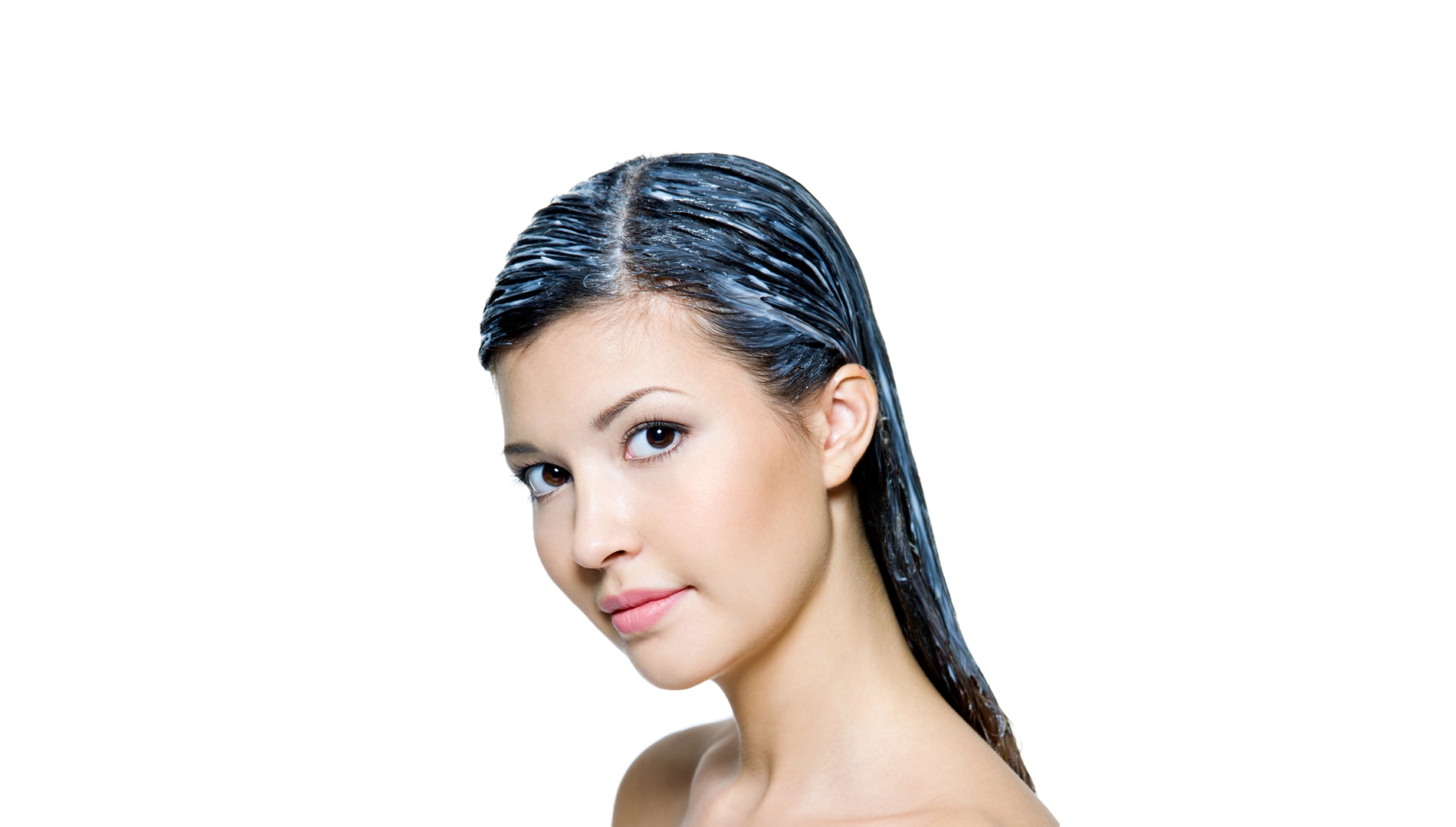 Young girl dyeing hair mask on hair for hair growth and Hair fall control