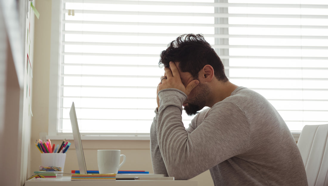 Man upset with premature Greying hair